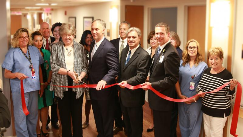 Pictured from left: (front row) Joanne Collyer, RN; Jean MacCormack, Chair of the Board of Trustees of Southcoast Health System and Southcoast Hospitals Group; New Bedford Mayor Jon Mitchell; State Representative Tony Cabral; Keith Hovan, President and CEO of Southcoast Health; Rebecca Dias, RN; Norma Warburton, St. Luke’s Auxiliary President; (back row) Christine Pereira, RN; Jack Dresser, Sr. Vice President & Chief Philanthropy Officer; Emily Cisek, MD; Uma Harinarayanan, MD; State Representative Paul Schmid; Lisa Tibbetts, Director of the Family Centered Unit at St. Luke’s; Ruth Milam, RN. BY SOUTHCOAST HEALTH